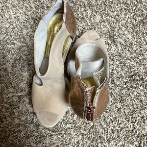 Michael Kors nude and rose gold platform heels.